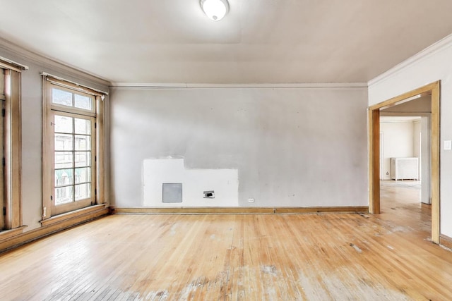 1532 E 59th St Unit J3, Chicago, IL 60637 - unfurnished room with wood-type flooring, crown molding, and radiator heating unit
