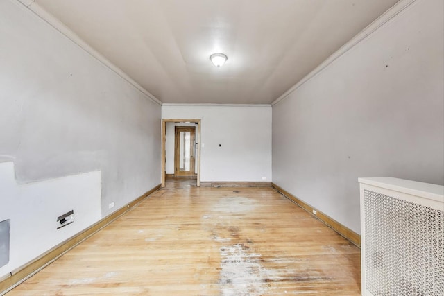 1532 E 59th St Unit J3, Chicago, IL 60637 - unfurnished room featuring ornamental molding and light wood-style floors