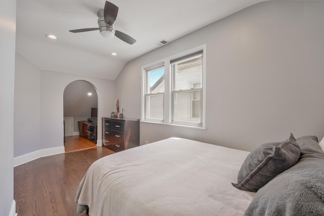 2610 N Major Ave, Chicago, IL 60639 - bedroom featuring lofted ceiling, wood finished floors, arched walkways, recessed lighting, and ceiling fan
