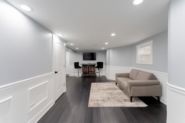 2610 N Major Ave, Chicago, IL 60639 - living room with wainscoting, recessed lighting, dark wood-type flooring, and a decorative wall