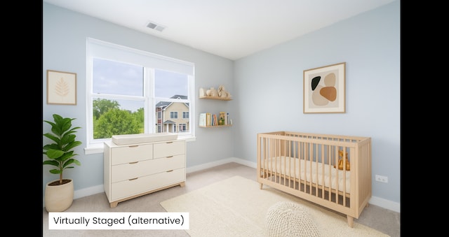 1420 Broadway St Unit 1420, Blue Island, IL 60406 - bedroom featuring multiple windows, light colored carpet, and a crib