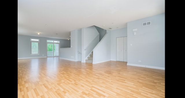 1420 Broadway St Unit 1420, Blue Island, IL 60406 - unfurnished living room with stairway and light wood-type flooring