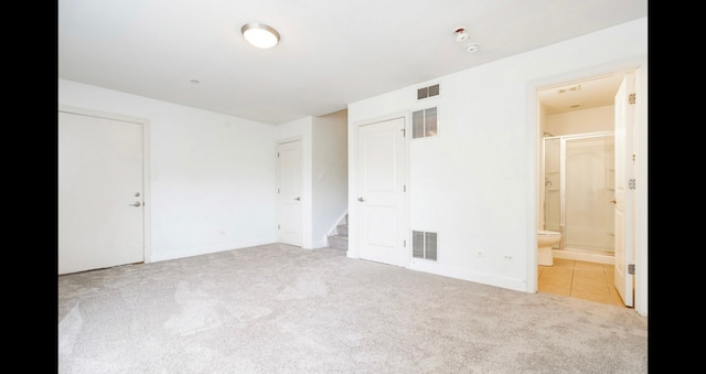 1420 Broadway St Unit 1420, Blue Island, IL 60406 - unfurnished bedroom with carpet, tile patterned floors, and connected bathroom