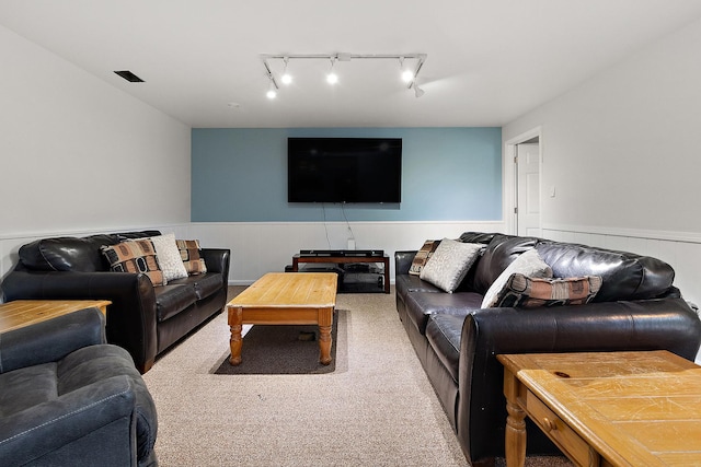5551 143rd St, Midlothian, IL 60445 - living room with wainscoting, rail lighting, and carpet