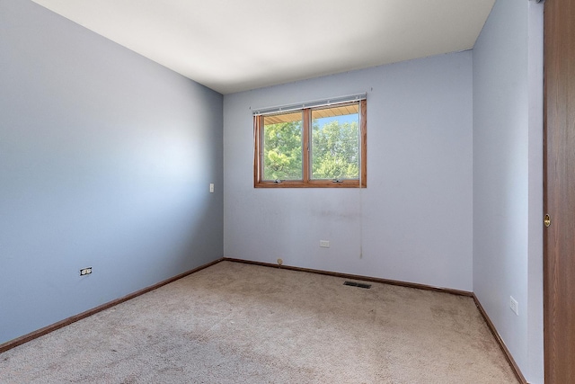 5551 143rd St, Midlothian, IL 60445 - carpeted empty room with baseboards