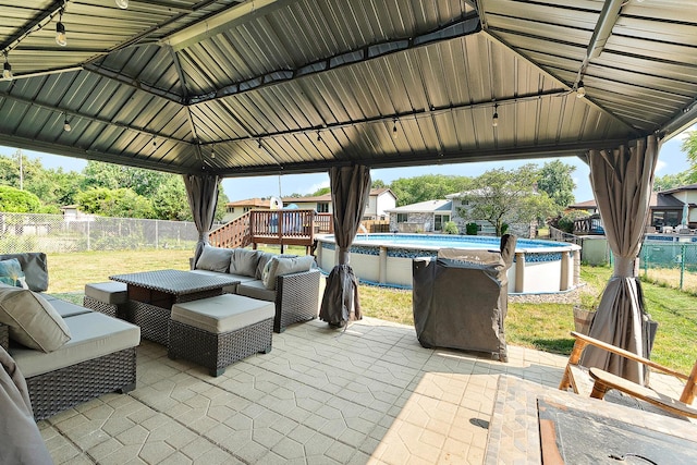 5551 143rd St, Midlothian, IL 60445 - fenced backyard with a gazebo, outdoor lounge area, and a patio area