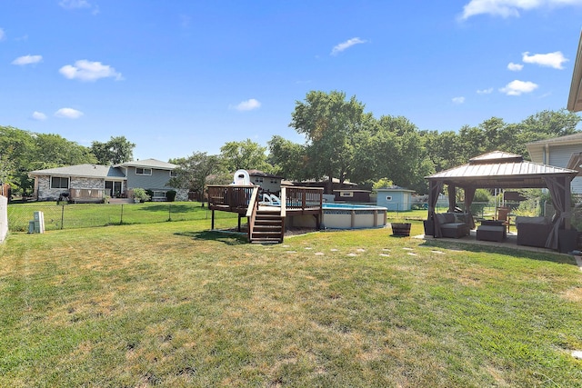 5551 143rd St, Midlothian, IL 60445 - view of yard with a gazebo, an outdoor hangout area, an outdoor pool, and a deck
