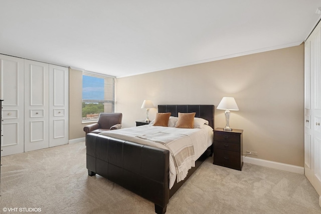 1500 Sheridan Rd Unit 7G, Wilmette, IL 60091 - bedroom featuring light carpet and crown molding