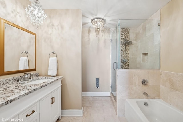 1500 Sheridan Rd Unit 7G, Wilmette, IL 60091 - full bathroom featuring a chandelier, vanity, a bath, and a shower stall