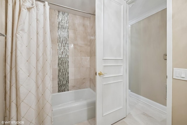 1500 Sheridan Rd Unit 7G, Wilmette, IL 60091 - bathroom featuring shower / tub combo with curtain, marble finish floors, and ornamental molding