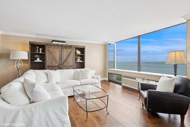 1500 Sheridan Rd Unit 7G, Wilmette, IL 60091 - living area featuring hardwood / wood-style flooring, crown molding, an AC wall unit, and a water view