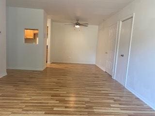 1486 Stonebridge Cir Unit A3, Wheaton, IL 60189 - hall featuring wood finished floors