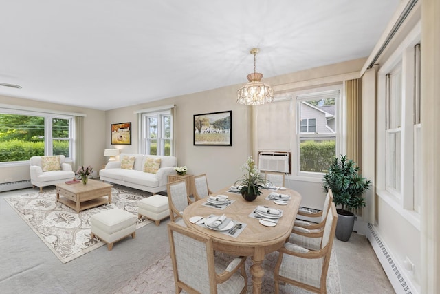 200 Eastwood Ct, Port Barrington, IL 60010 - carpeted living area with a baseboard radiator and a chandelier