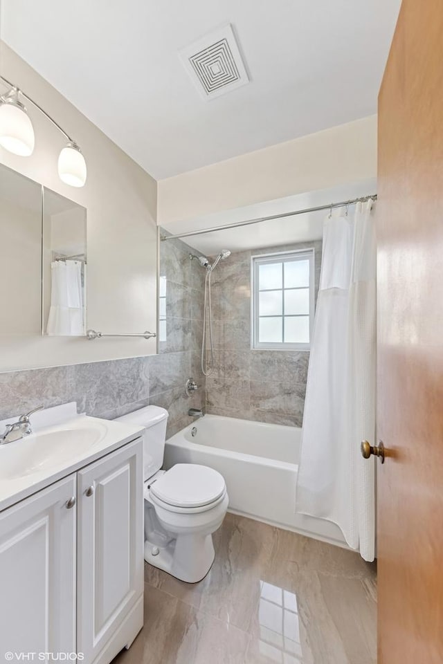 200 Eastwood Ct, Port Barrington, IL 60010 - full bathroom featuring vanity, shower / bath combo, and tile walls