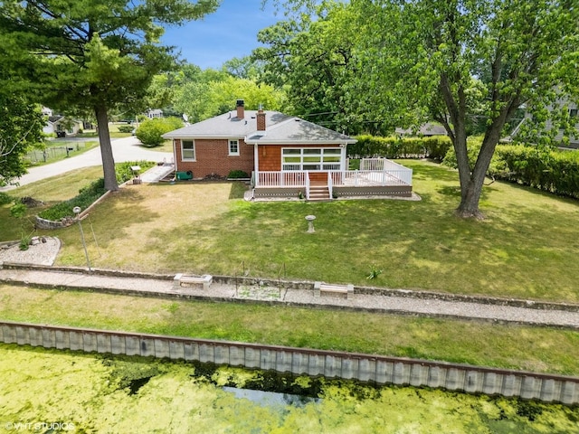200 Eastwood Ct, Port Barrington, IL 60010 - rear view of house with a deck, a chimney, and a yard