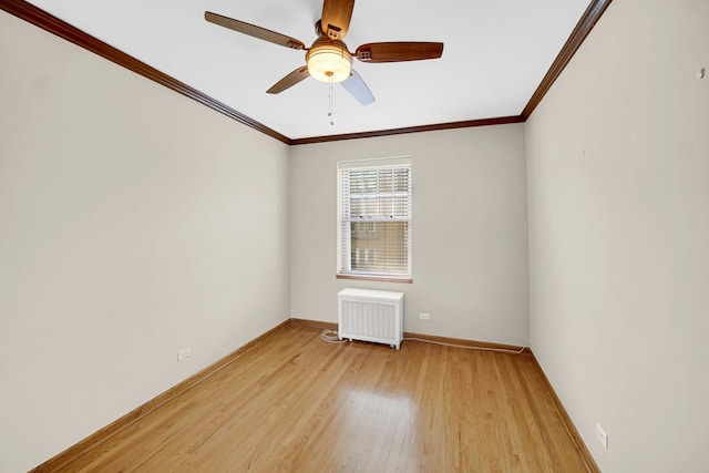 10911 S Longwood Dr Unit 2, Chicago, IL 60643 - spare room featuring radiator heating unit, crown molding, light wood finished floors, and ceiling fan