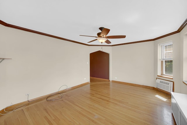 10911 S Longwood Dr Unit 2, Chicago, IL 60643 - unfurnished room with light wood-style flooring, ceiling fan, ornamental molding, a wall mounted AC, and arched walkways
