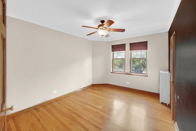 10911 S Longwood Dr Unit 2, Chicago, IL 60643 - unfurnished room featuring light wood-type flooring, ceiling fan, and washer / dryer