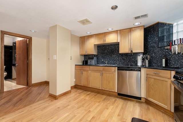 4744 S Prairie Ave Unit 1A, Chicago, IL 60615 - kitchen with appliances with stainless steel finishes, light wood-type flooring, tasteful backsplash, and recessed lighting