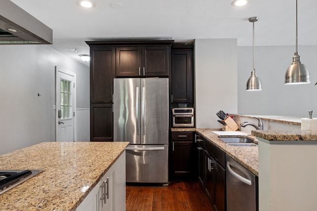 7942 Tennessee Ave, Willowbrook, IL 60527 - kitchen with appliances with stainless steel finishes, dark wood-style flooring, light stone countertops, recessed lighting, and hanging light fixtures