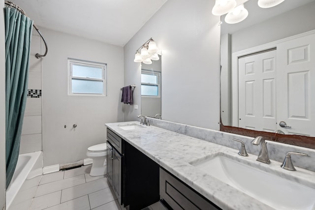7942 Tennessee Ave, Willowbrook, IL 60527 - bathroom featuring double vanity, shower / bath combo with shower curtain, and tile patterned floors
