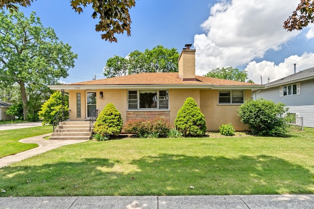 3104 Maple St, Franklin Park, IL 60131 - ranch-style home with a chimney, a front yard, and brick siding