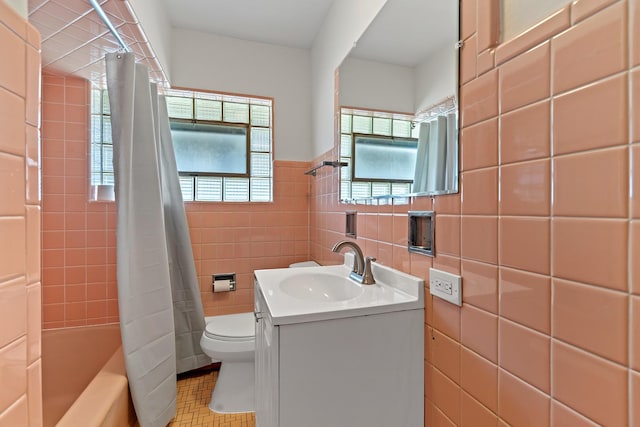3104 Maple St, Franklin Park, IL 60131 - bathroom with tile walls, vanity, tile patterned floors, and shower / bath combo