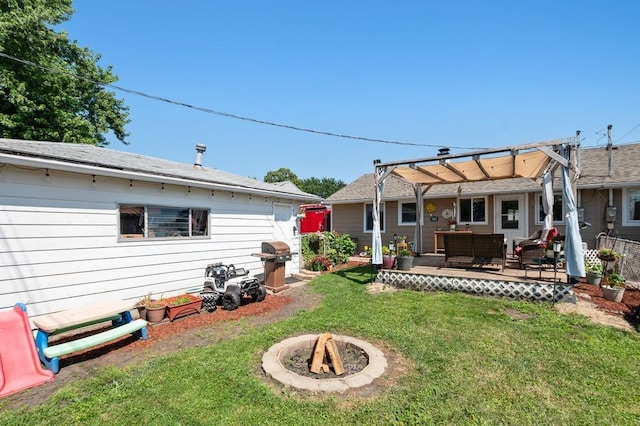 8882 S Main St, Hometown, IL 60456 - view of green lawn featuring an outdoor living space with a fire pit and a pergola