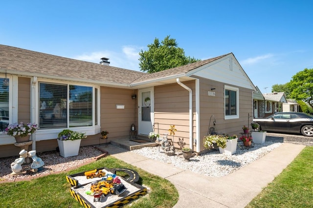 8882 S Main St, Hometown, IL 60456 - bungalow-style home featuring roof with shingles