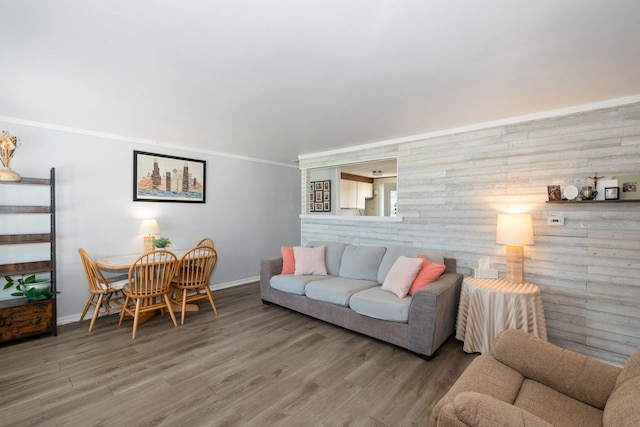 8882 S Main St, Hometown, IL 60456 - living room featuring wood finished floors, ornamental molding, and wooden walls