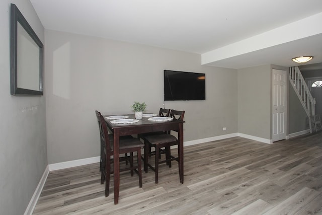 446 Northampton Ln, Roselle, IL 60172 - dining room featuring wood finished floors and stairs