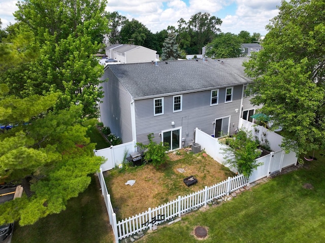 446 Northampton Ln, Roselle, IL 60172 - back of house with a shingled roof, a fenced backyard, and view of scattered trees