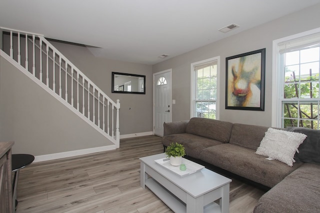 446 Northampton Ln, Roselle, IL 60172 - living room featuring stairway and light wood-style floors