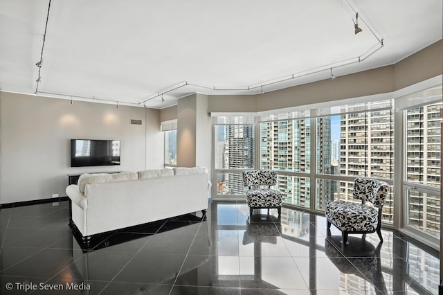 100 E Huron St Unit 2301, Chicago, IL 60611 - living room with track lighting, healthy amount of natural light, granite floors, and a view of city