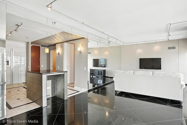 100 E Huron St Unit 2301, Chicago, IL 60611 - living area featuring track lighting and granite floors