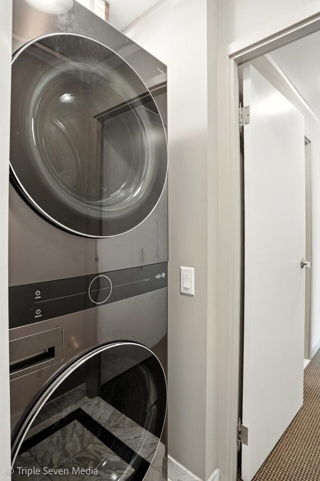 100 E Huron St Unit 2301, Chicago, IL 60611 - laundry area featuring stacked washer / dryer