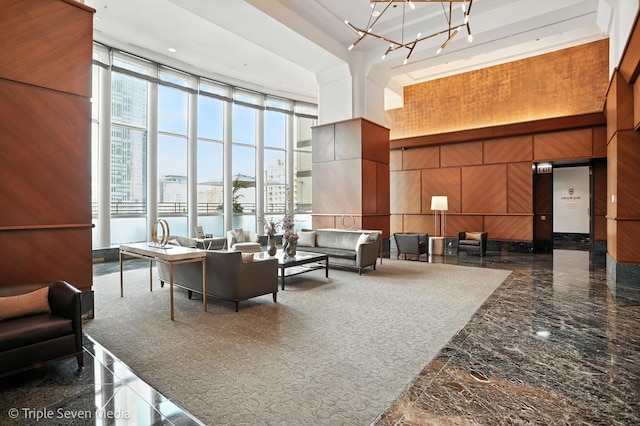100 E Huron St Unit 2301, Chicago, IL 60611 - common area with a high ceiling, expansive windows, and wooden walls