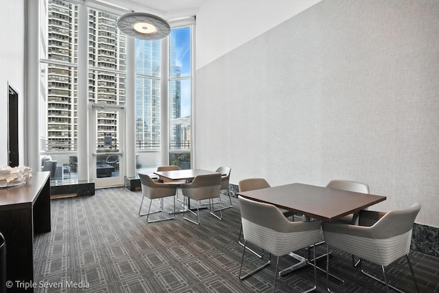 100 E Huron St Unit 2301, Chicago, IL 60611 - carpeted dining room featuring expansive windows, plenty of natural light, and a high ceiling
