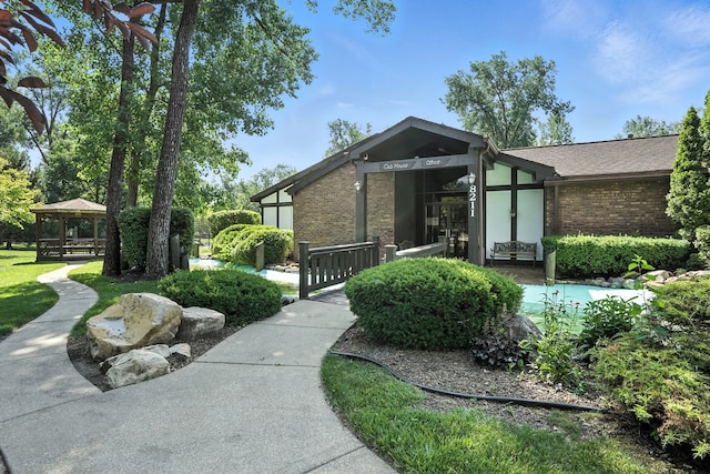 11315 Sycamore Ln Unit B, Palos Hills, IL 60465 - view of front facade with brick siding and a gazebo