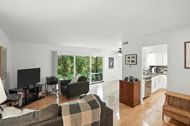 11315 Sycamore Ln Unit B, Palos Hills, IL 60465 - living area featuring light wood-style flooring and ceiling fan