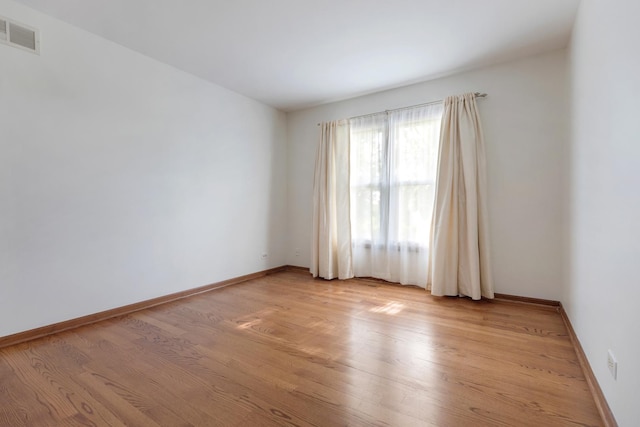 775 Harmon Blvd, Hoffman Estates, IL 60169 - spare room featuring light wood-type flooring and baseboards