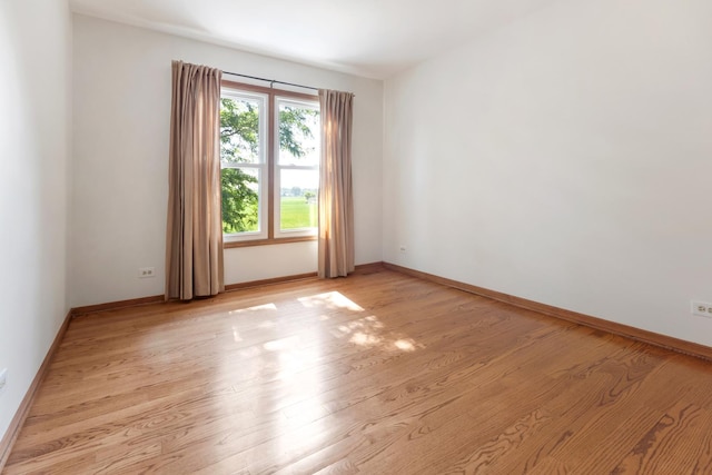 775 Harmon Blvd, Hoffman Estates, IL 60169 - unfurnished room with light wood-style floors and baseboards