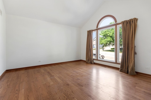 775 Harmon Blvd, Hoffman Estates, IL 60169 - spare room with wood finished floors and high vaulted ceiling