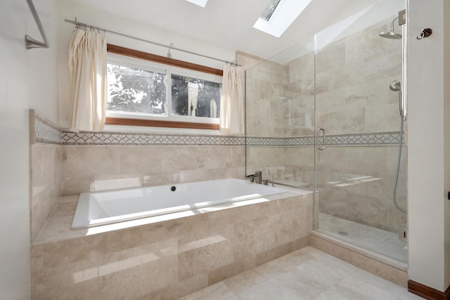775 Harmon Blvd, Hoffman Estates, IL 60169 - full bathroom featuring a skylight, a shower stall, a bath, and tile patterned floors
