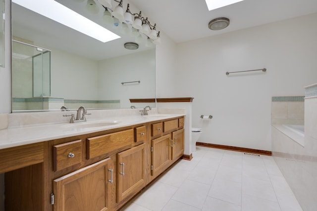 775 Harmon Blvd, Hoffman Estates, IL 60169 - full bathroom featuring a skylight, double vanity, a garden tub, tile patterned floors, and an enclosed shower