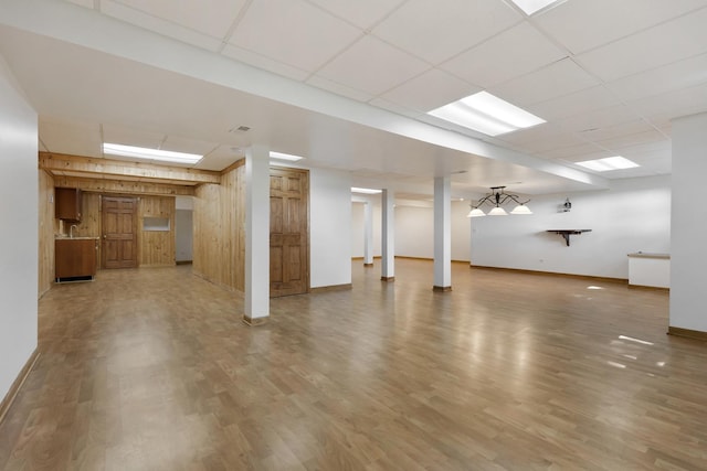 775 Harmon Blvd, Hoffman Estates, IL 60169 - finished basement with wooden walls, wood finished floors, and a paneled ceiling