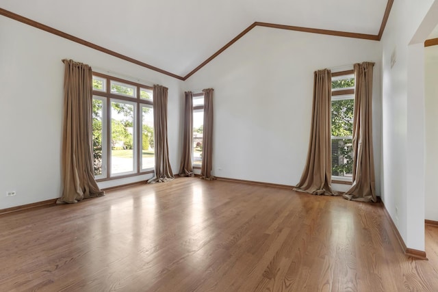 775 Harmon Blvd, Hoffman Estates, IL 60169 - unfurnished room with ornamental molding, lofted ceiling, healthy amount of natural light, and light wood-style floors