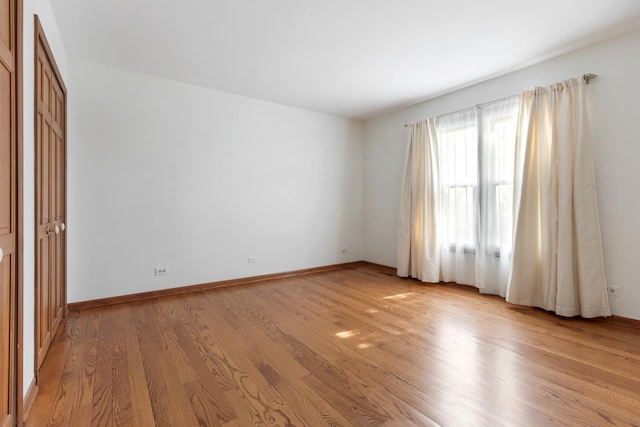 775 Harmon Blvd, Hoffman Estates, IL 60169 - spare room featuring light wood-style flooring and baseboards