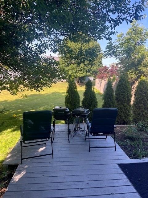 438 Meadow Hill Ln, Round Lake Beach, IL 60073 - wooden terrace with a yard