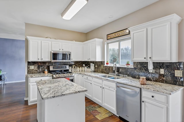 22600 W Reserve Cir, Plainfield, IL 60544 - kitchen with stainless steel appliances, white cabinets, and decorative backsplash